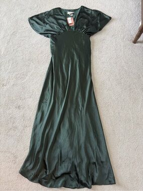 holiday dress with bow in back Katie Holmes Just Wore One of the Season's Biggest Trends RL:2026tues main image 1